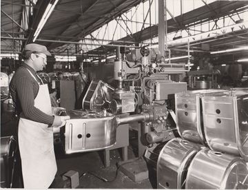 Assembling stainless steel parts to make a tub for a top loader washing machine (Source: BSH Corporate Archives).